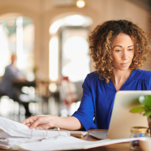 Woman in Blue Shirt Working Remotely